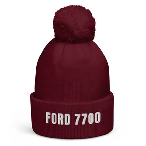 The Tractor Mugs Store Burgundy Ford 7700 | Pom-Pom Beanie Quality Farmers Merch
